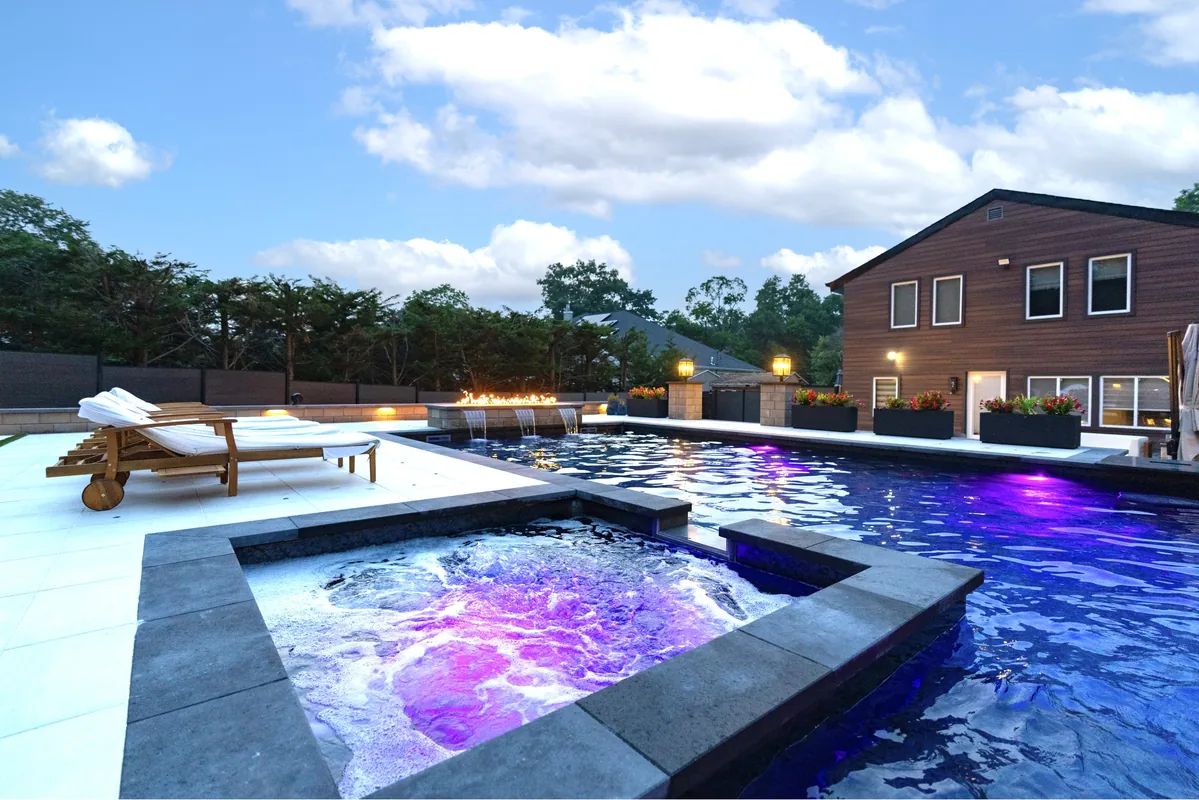 Custom gunite pool by Flawless Masonry — Long Island backyard installation