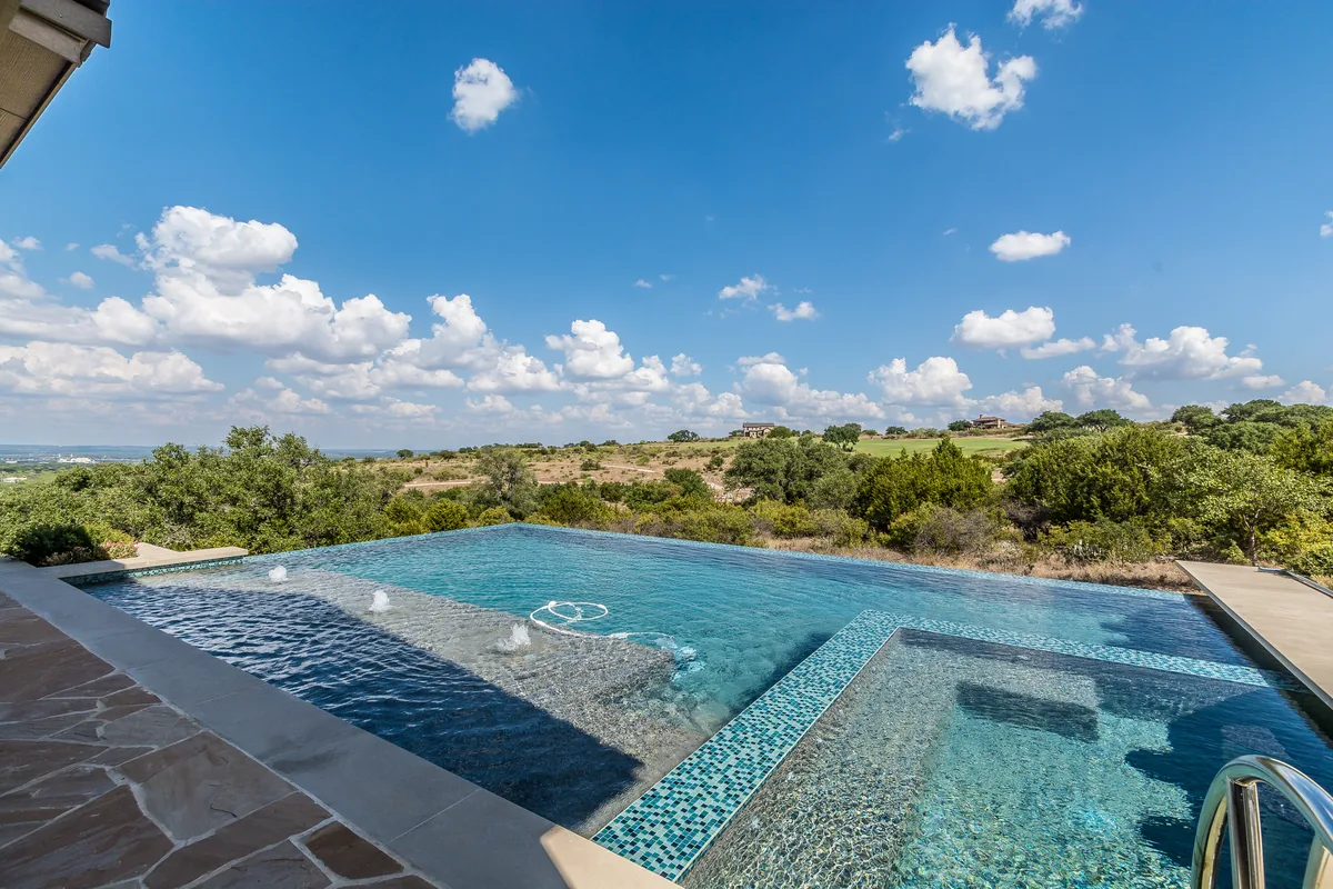 Gunite in-ground pool with stone patio — Nassau County
