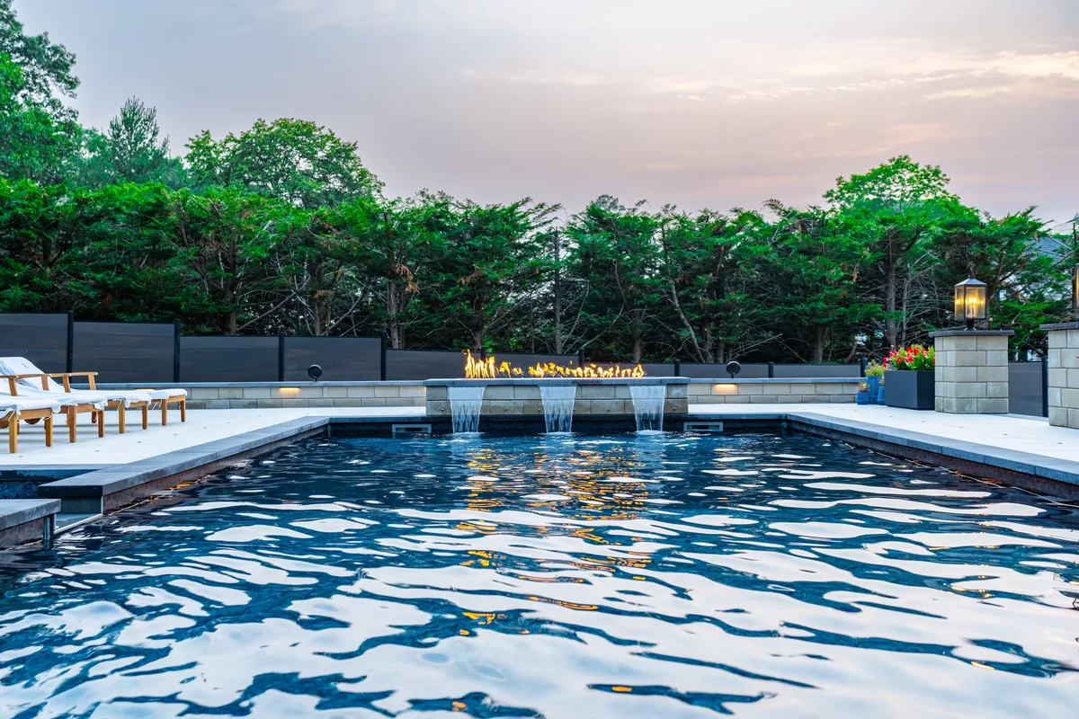 Flawless Masonry gunite pool — backyard transformation