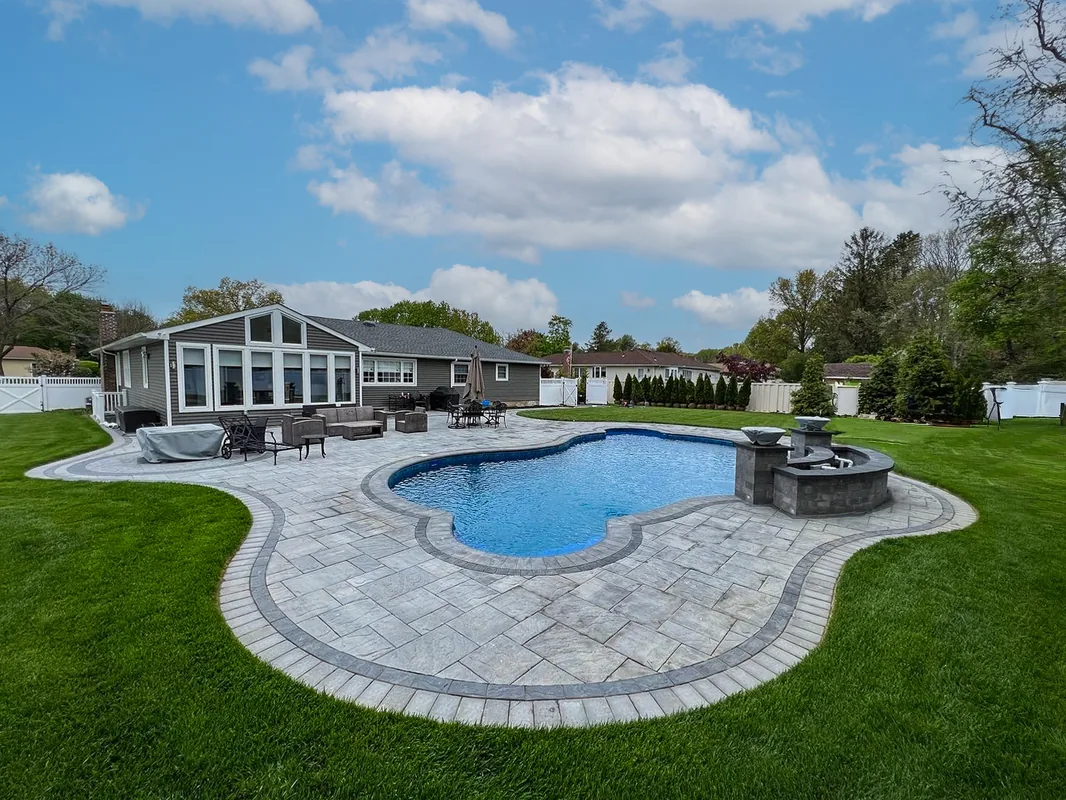 Vinyl in-ground pool with patio — Nassau County