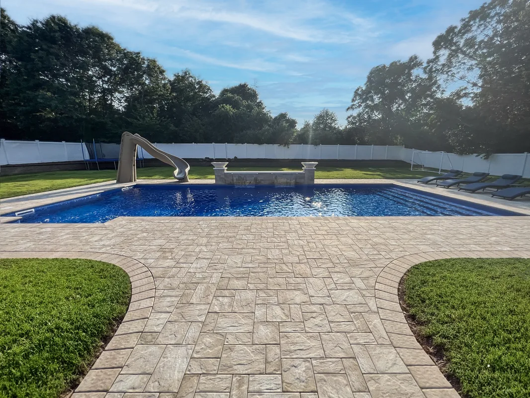 Custom vinyl pool with tanning ledge and hot tub